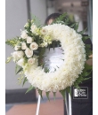 Funeral Wreath -  White poms, ivory roses, dendrobium orchids  Condolence Wreath Singapore 