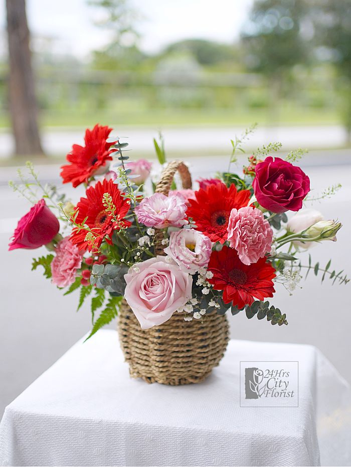 flower basket of red gerbera flowers