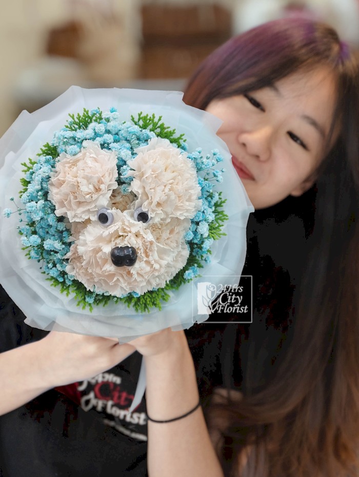 Puppy Kisses - An Adorable Puppy Face Arranged with Fresh Carnations in a Bouquet